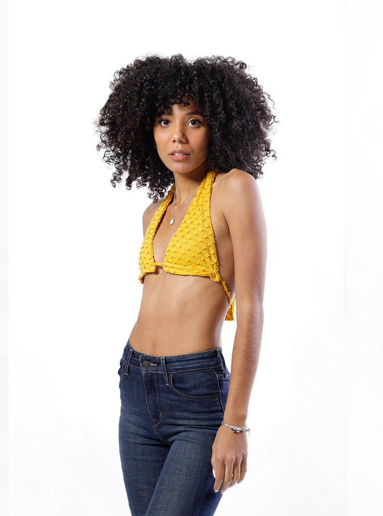 he Amara Multiwear Top is versatile and flexible. Wear it over 9 different ways. As a classic Halter top or ruched bandeau top woman-owned black-owned latina-owned diaspora new york  clothing womenswear top crop top cute top multiwear yellow